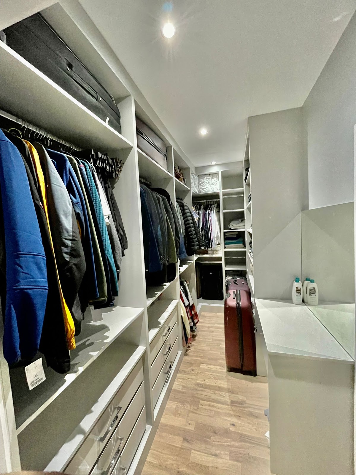 Walk-in wardrobe with shelving, hanging and drawers